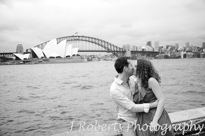 Couple kissing at Mrs Macquarie's Chair Sydney - engagement photography sydney